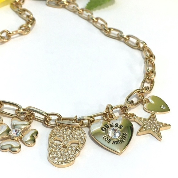 𝅺3/$29! Guess Necklace Skull, Shamrock, Stars - Picture 6 of 7